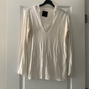 Cream colored base layer top with hood. Size S. Has been worn quite a bit.